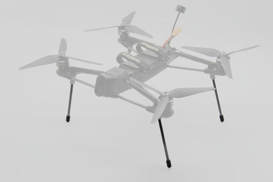 A light gray quadcopter drone with four propellers and landing legs, shown against a plain light gray background.