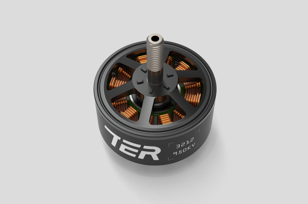 A high-performance drone motor, featuring a matte black cylindrical body with the white brand name 'TER' and technical specifications '3212' and '950KV'. The internal copper windings are clearly visible through the spokes, and a silver metal shaft extends from the top center, all set against a neutral light gray background.