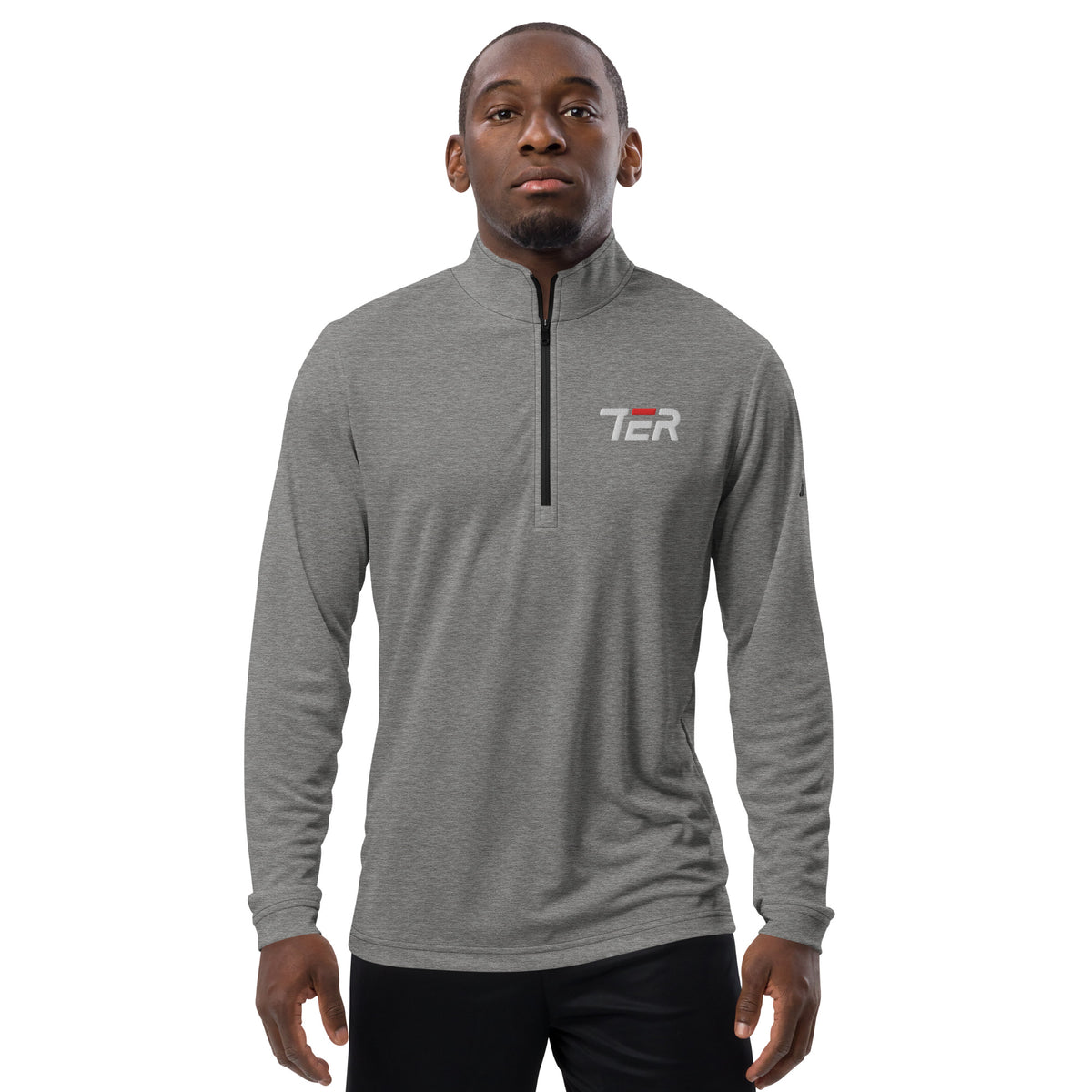 Man wearing a gray long-sleeve athletic pullover with a logo on a white background