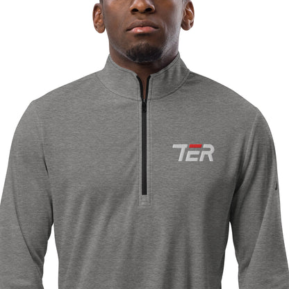 Man wearing a gray pullover with a logo on a white background